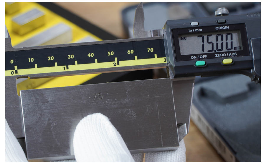 Calibrating digital caliper with a gauge block